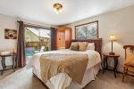 Master bedroom with slider that leads to private patio, en suite with walk in shower. 